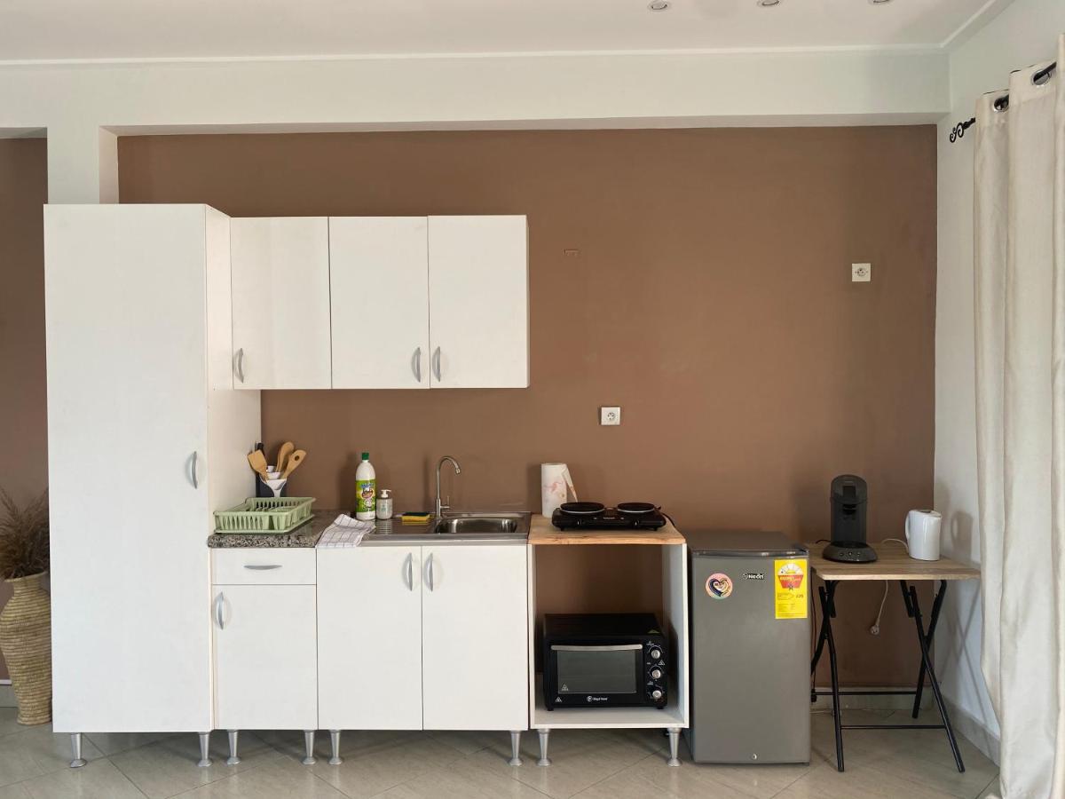 L'Oasis Guesthouse Котону Екстериор снимка