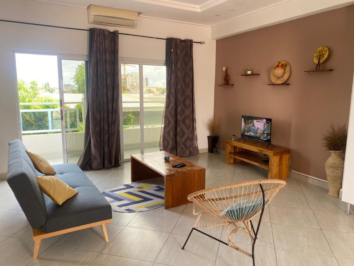 L'Oasis Guesthouse Котону Екстериор снимка