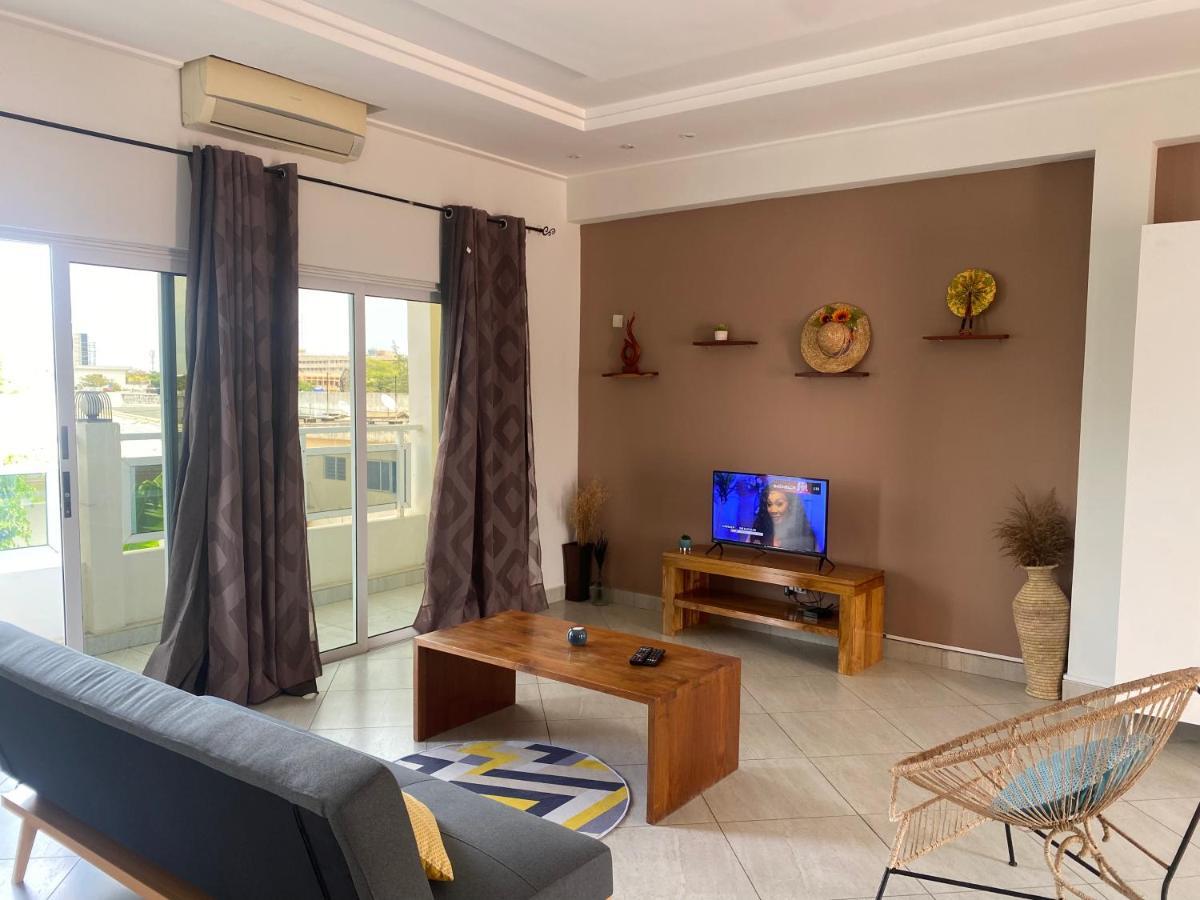 L'Oasis Guesthouse Котону Екстериор снимка
