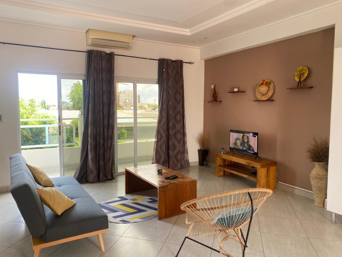 L'Oasis Guesthouse Котону Екстериор снимка