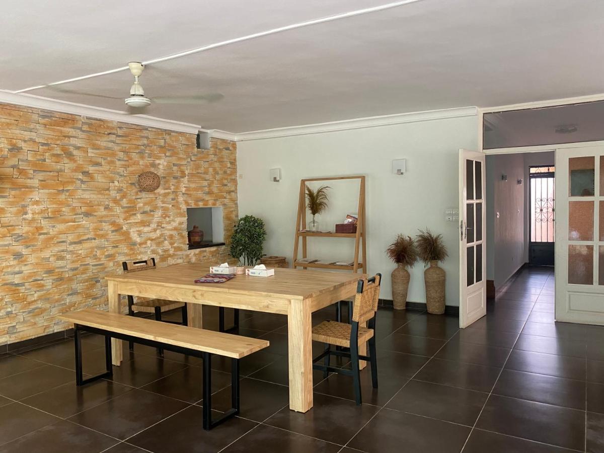 L'Oasis Guesthouse Котону Екстериор снимка