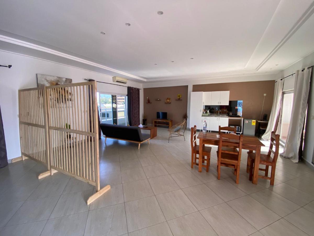 L'Oasis Guesthouse Котону Екстериор снимка