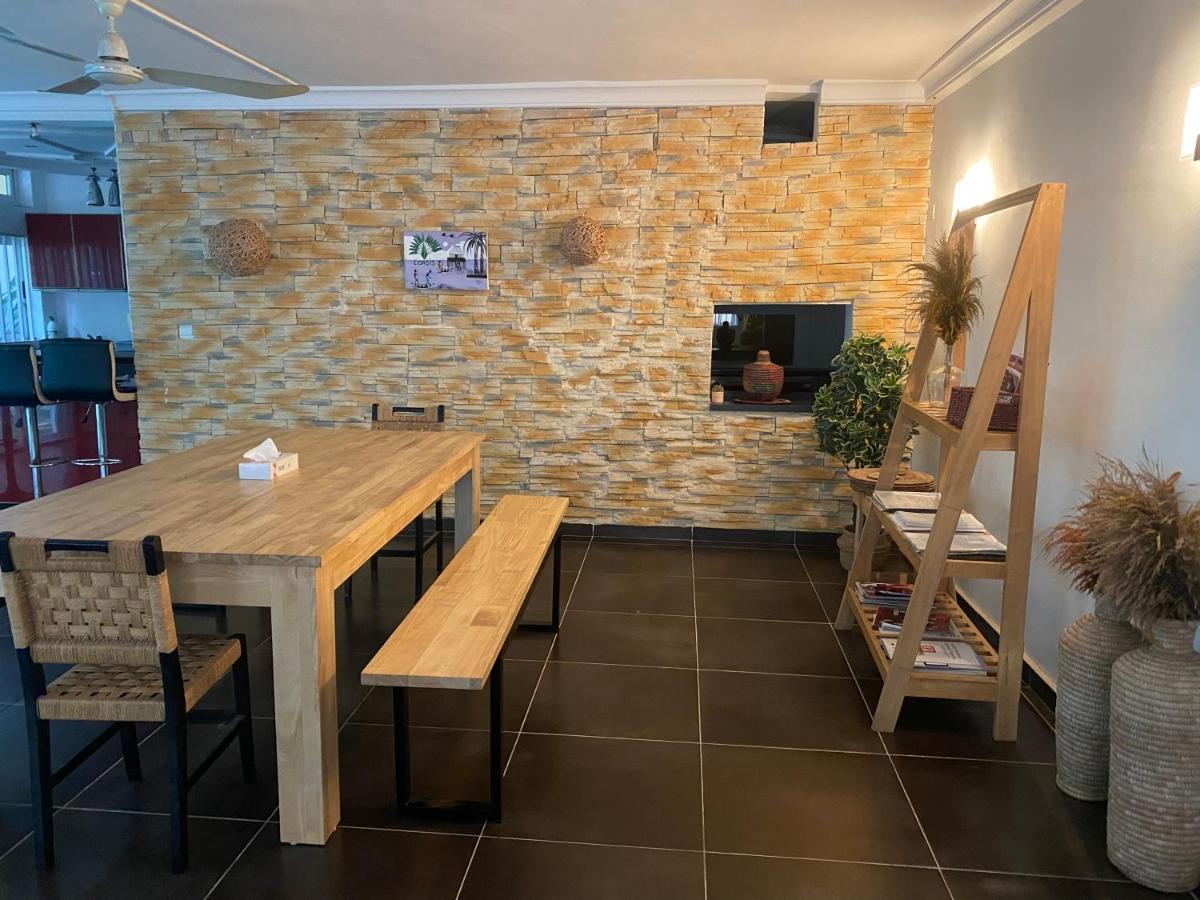 L'Oasis Guesthouse Котону Екстериор снимка