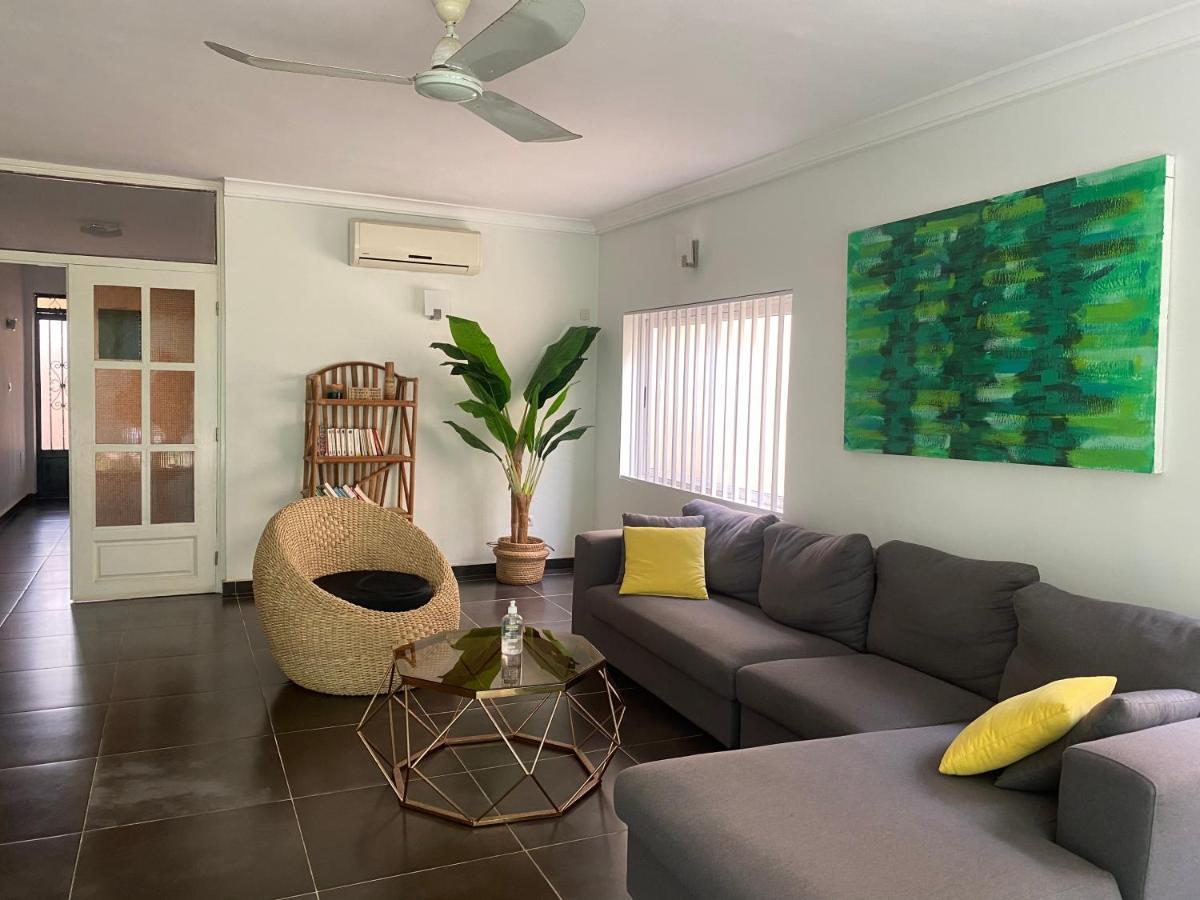 L'Oasis Guesthouse Котону Екстериор снимка