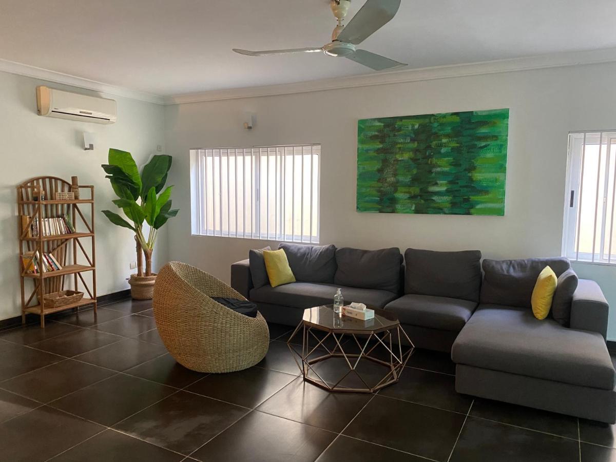 L'Oasis Guesthouse Котону Екстериор снимка