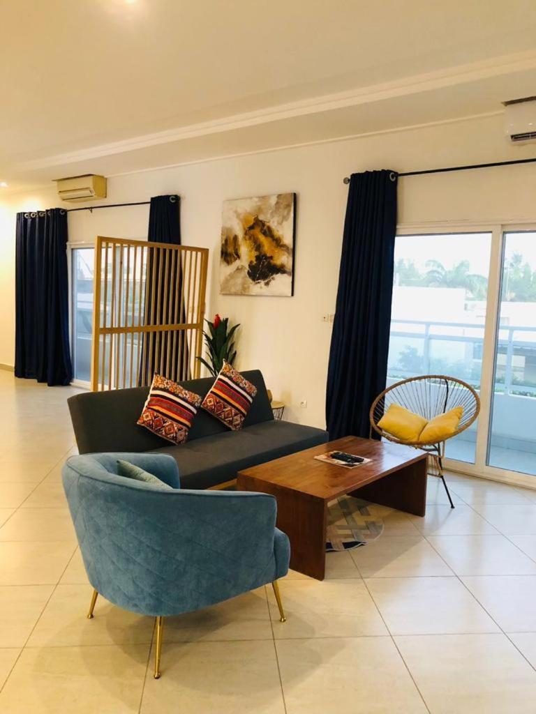 L'Oasis Guesthouse Котону Екстериор снимка