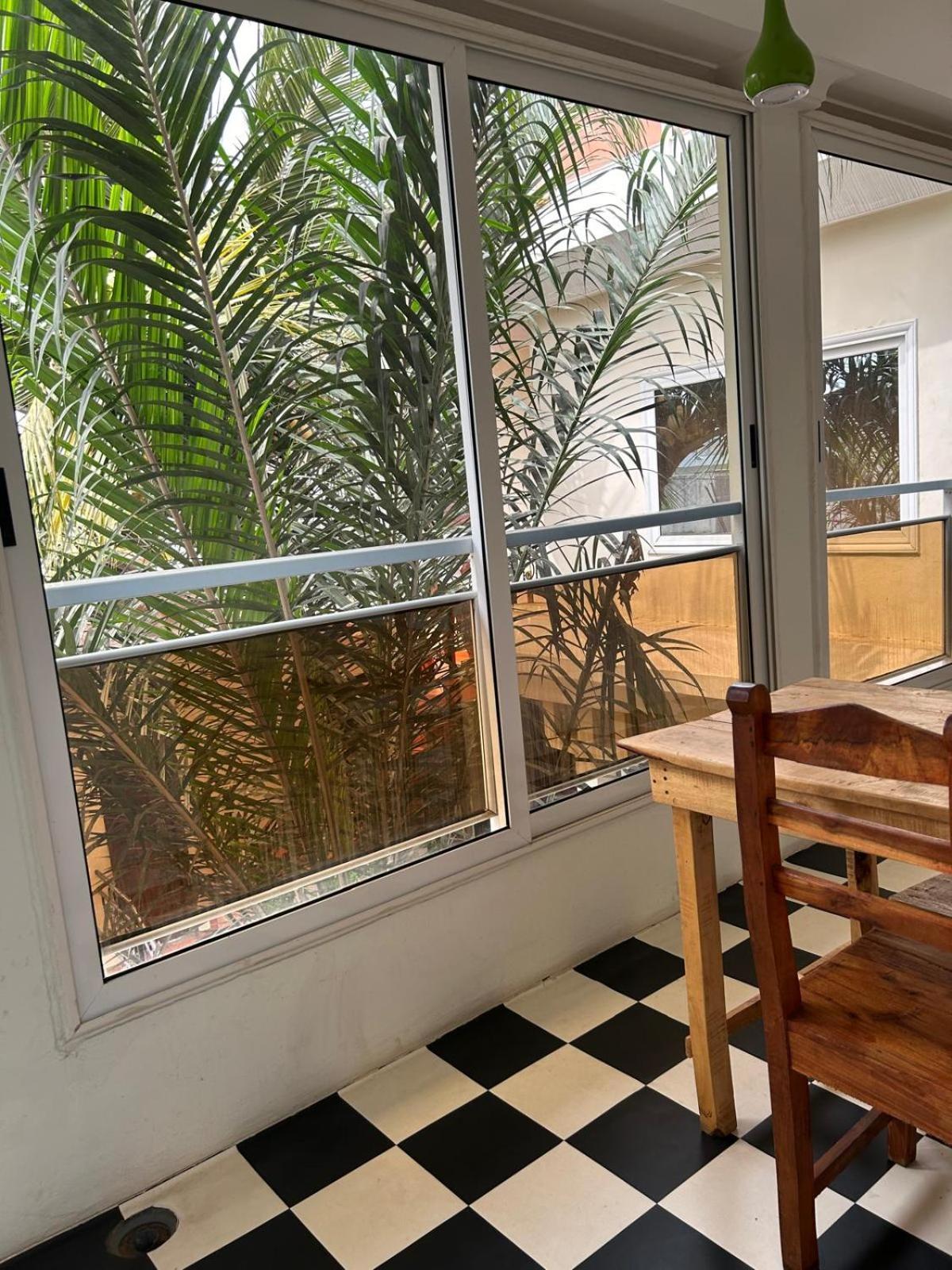 L'Oasis Guesthouse Котону Екстериор снимка