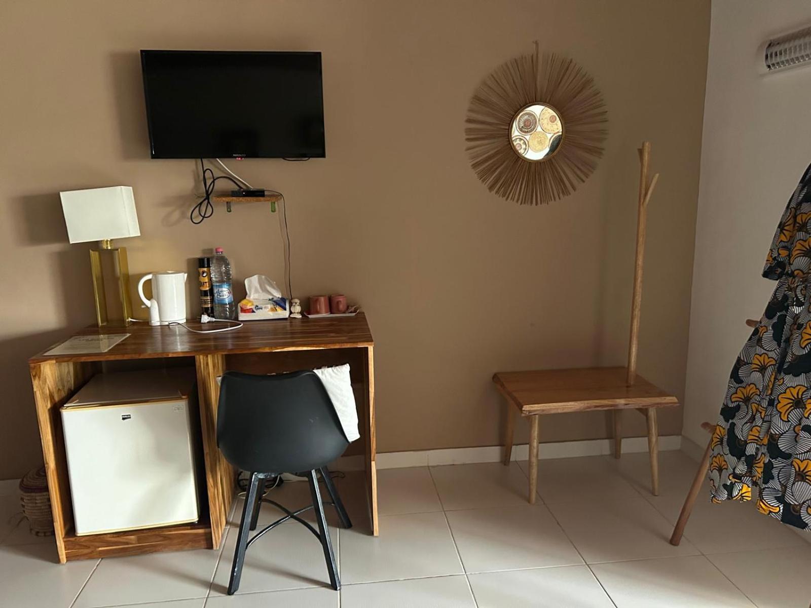 L'Oasis Guesthouse Котону Екстериор снимка